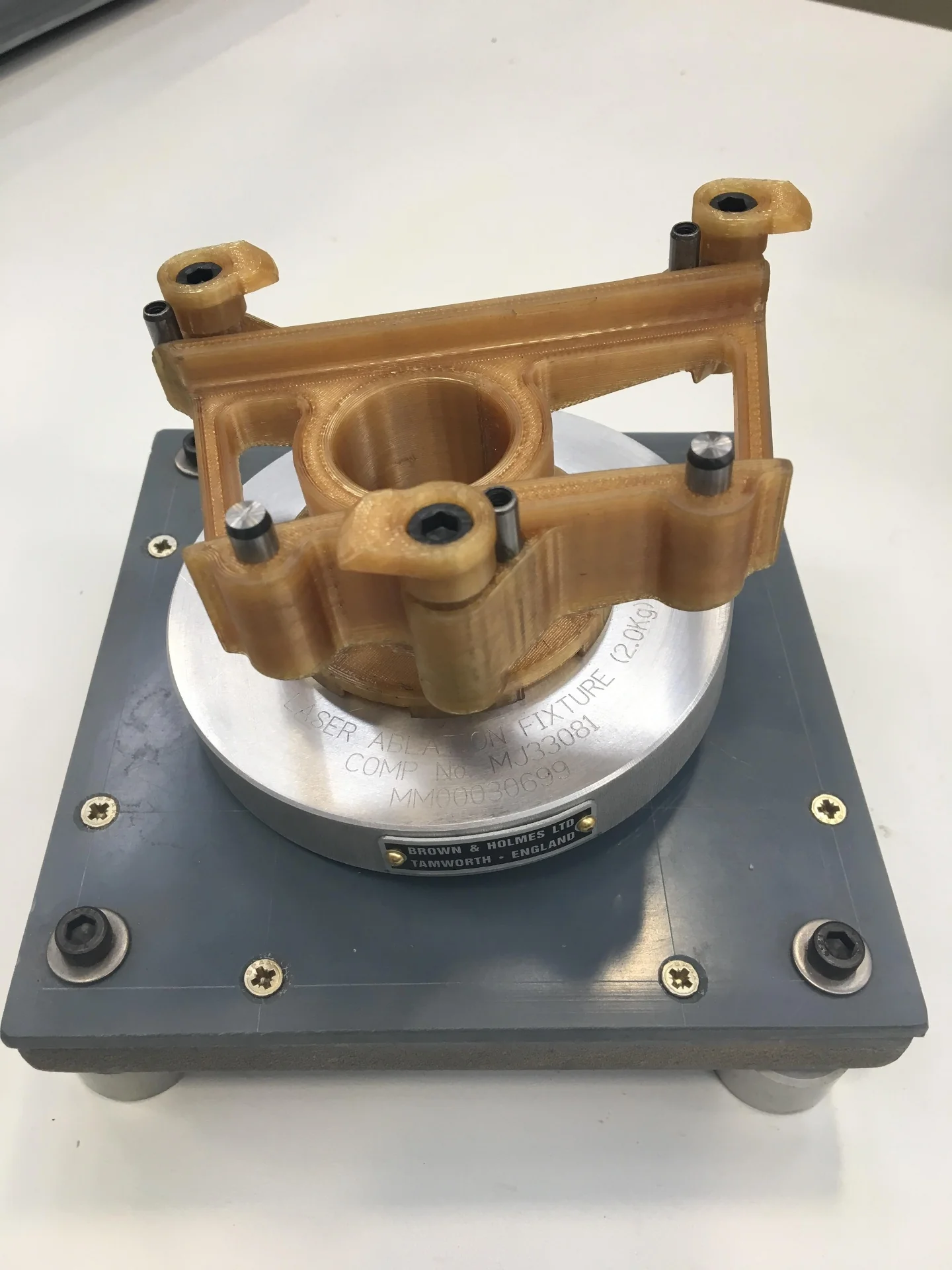 Industrial 3D printed fixture for laser ablation, produced in days, validated on the machine